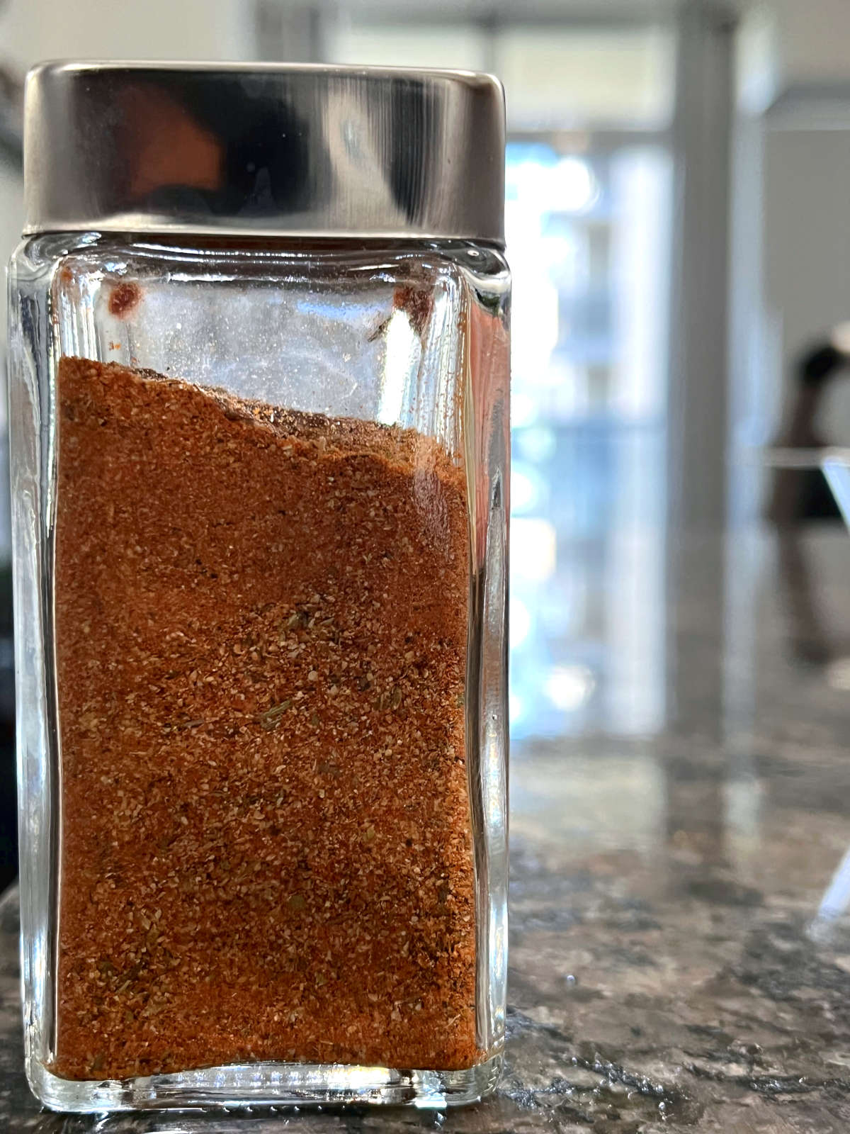 Homemade cajun seasoning stored in a jar
