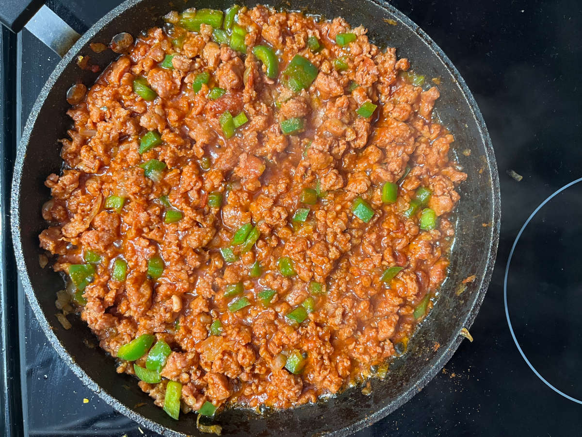 Sloppy joe sauce simmering in a pan