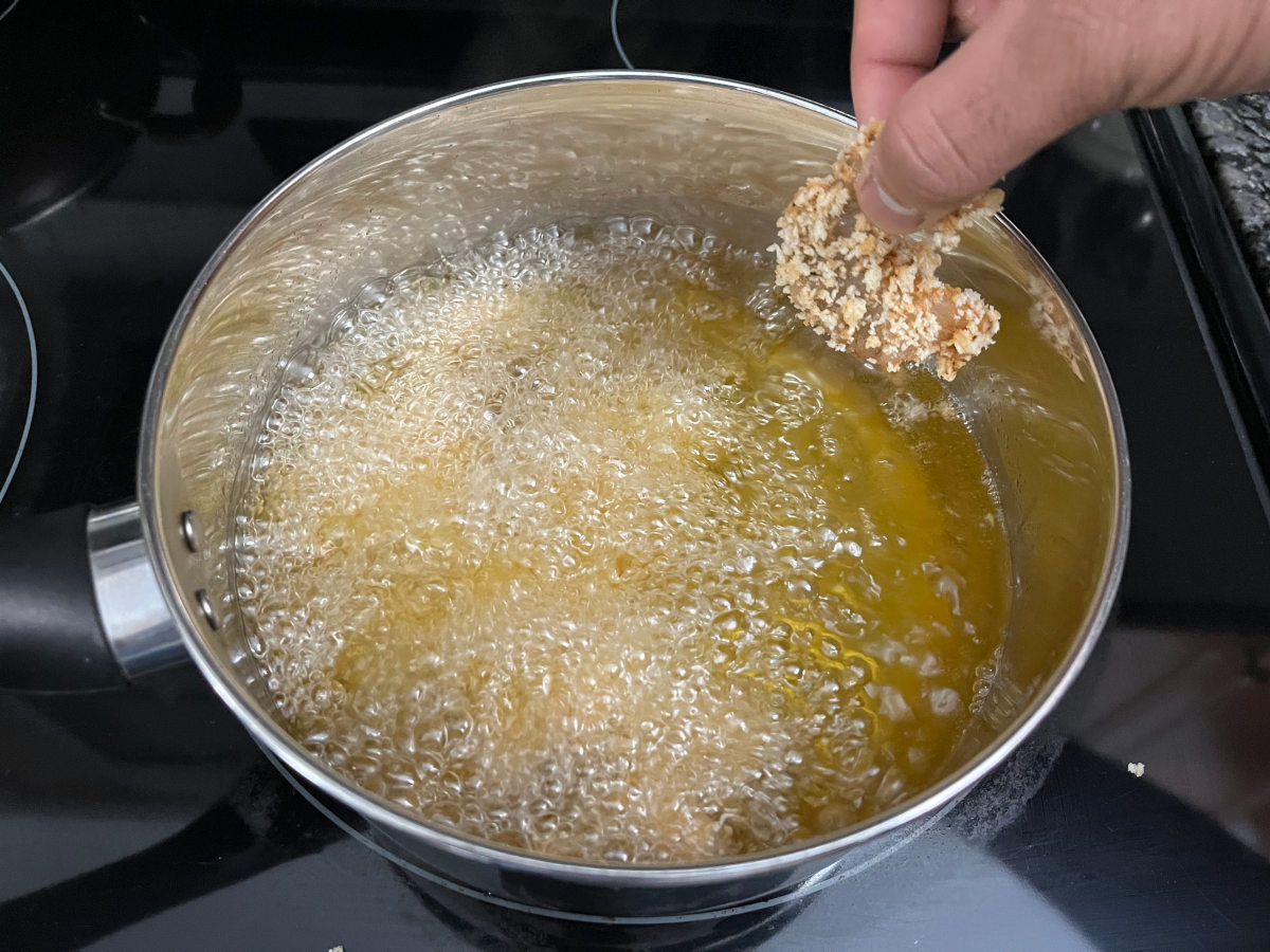 Deep frying the marinated shrimp