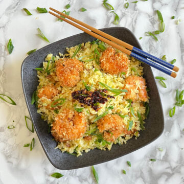 Shrimp fried rice with chopsticks on the side