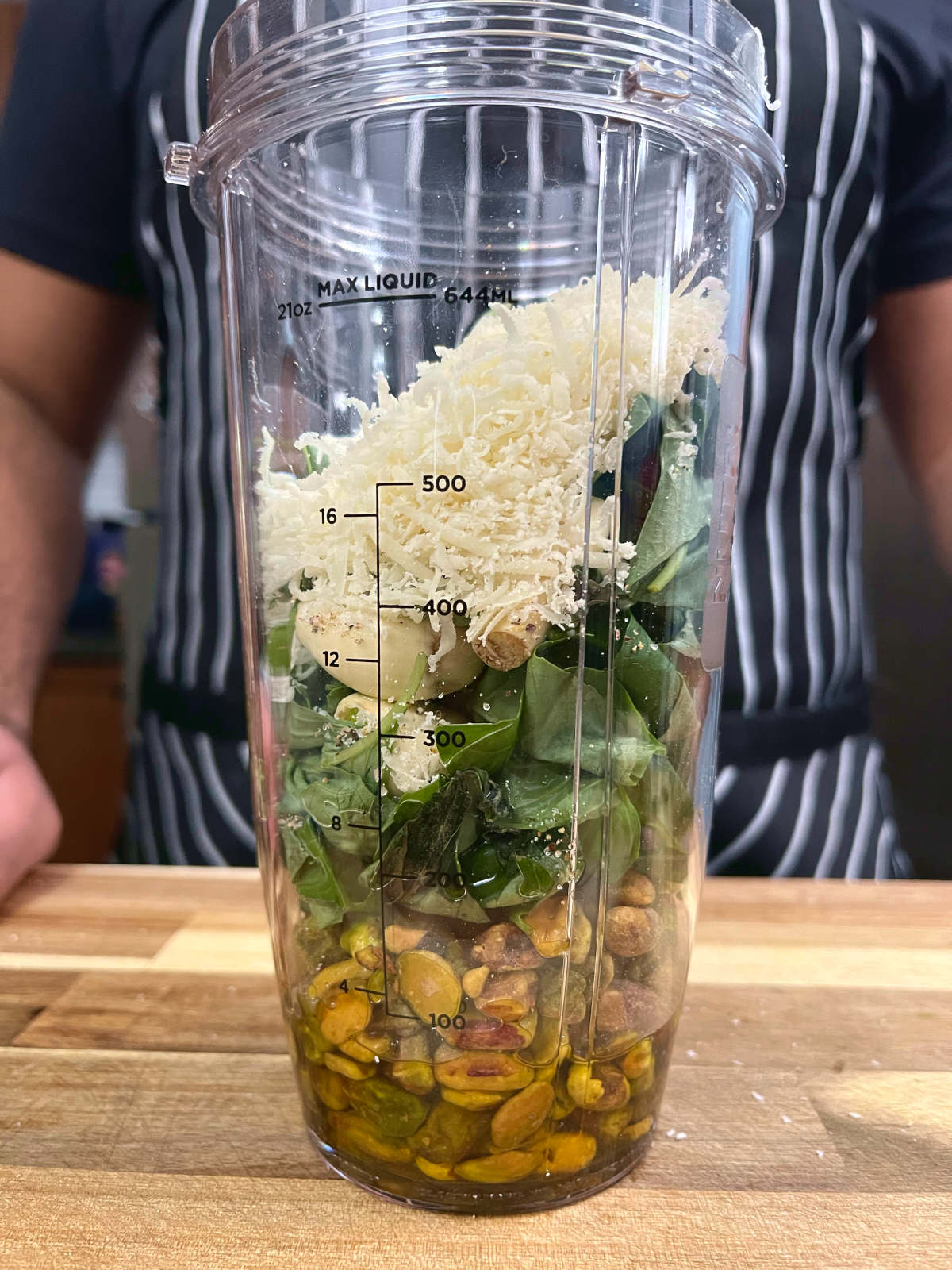 all ingredients for the pistachio basil pesto in a blender