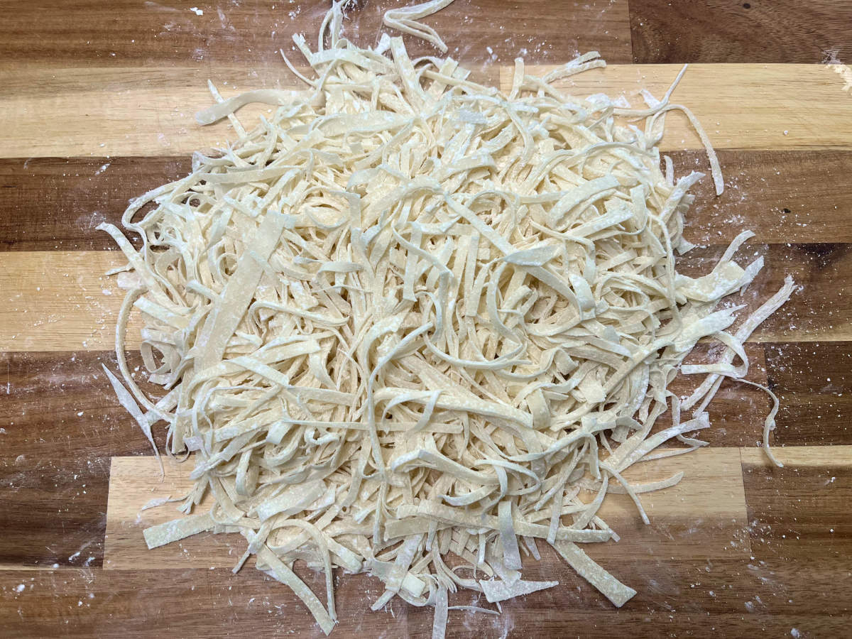 sliced spring roll wrappers on a cutting board