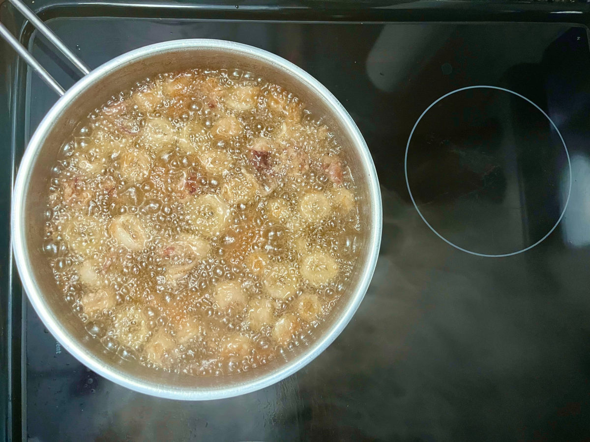 deep frying squid in a pan