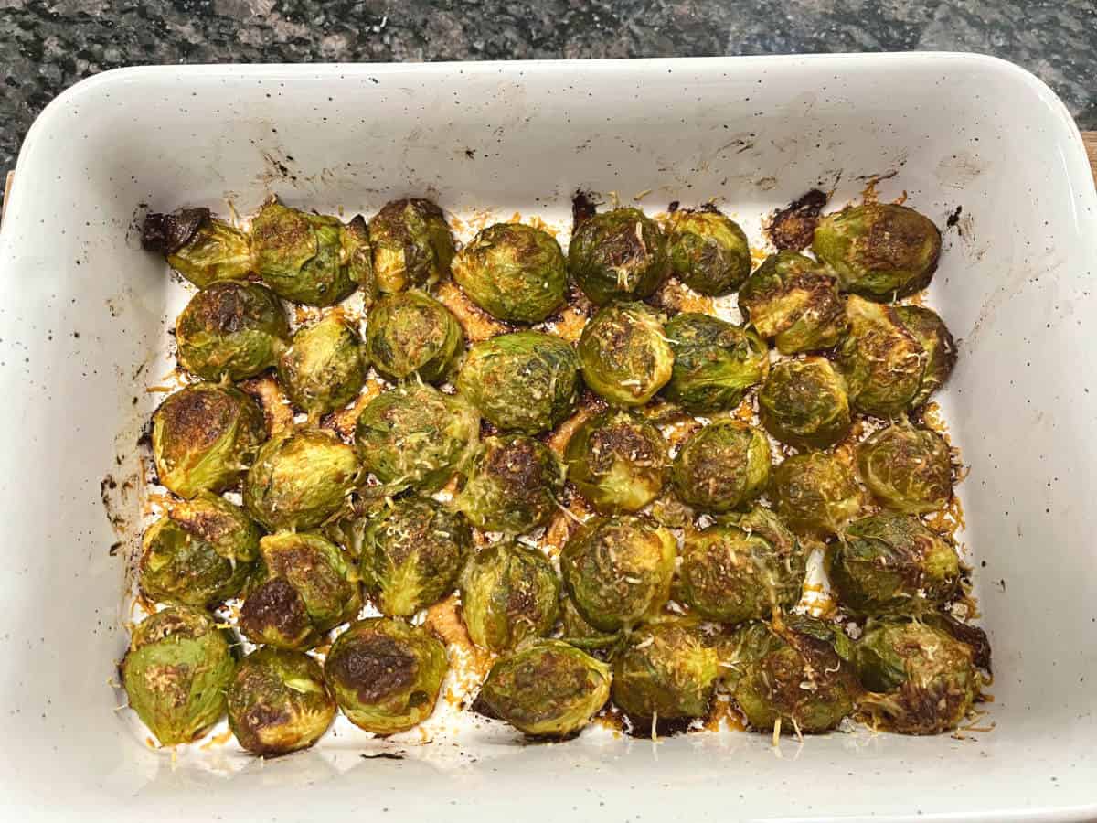 baked brussels sprouts in a baking tray