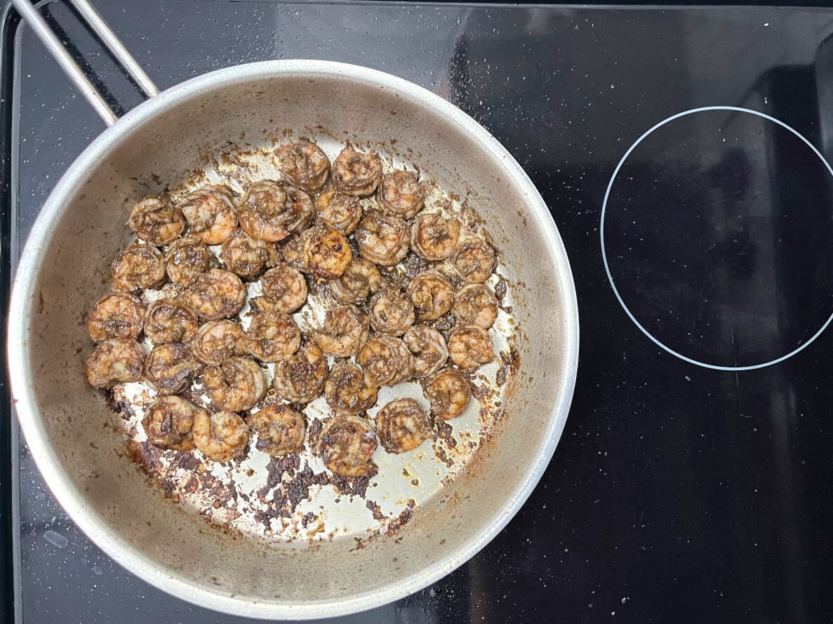 shrimps frying in a pan