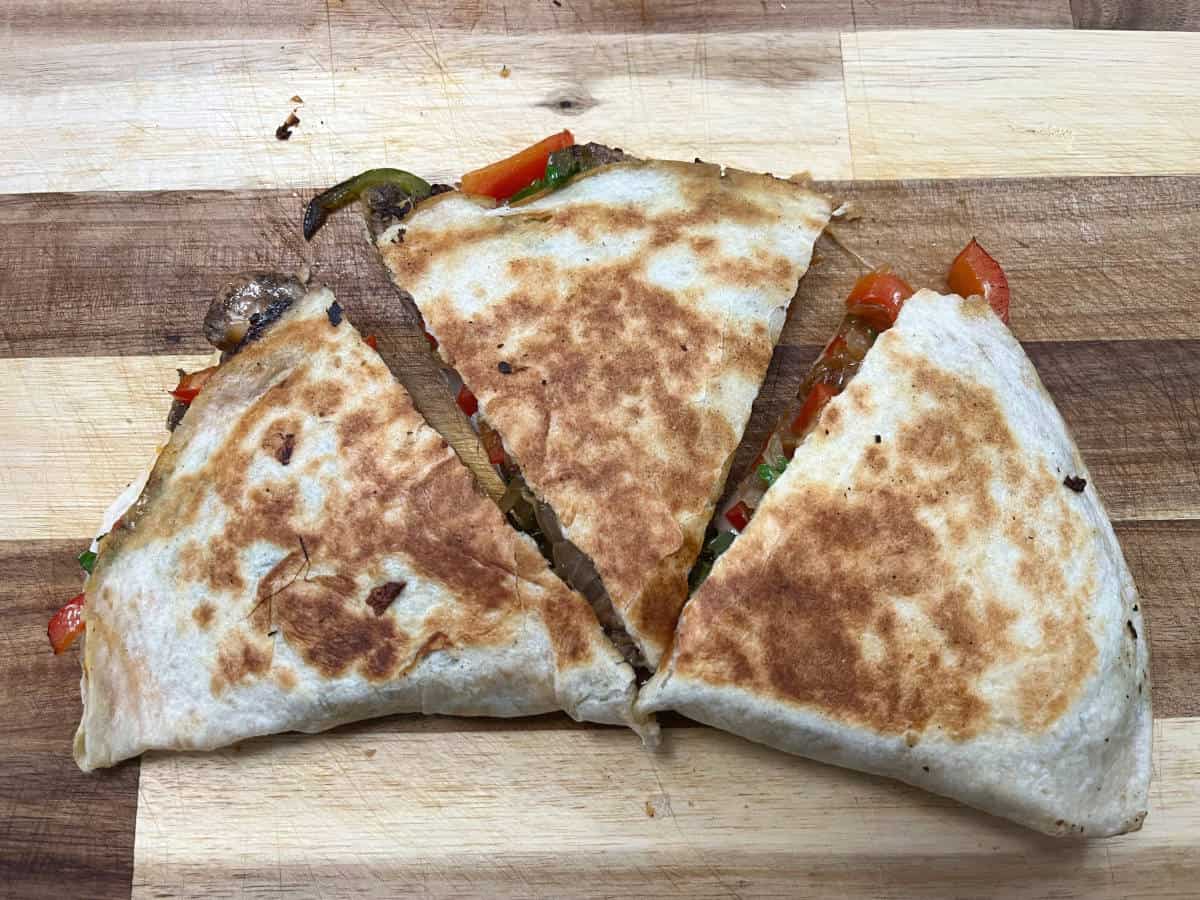 cut slices of jerk chicken quesadilla
