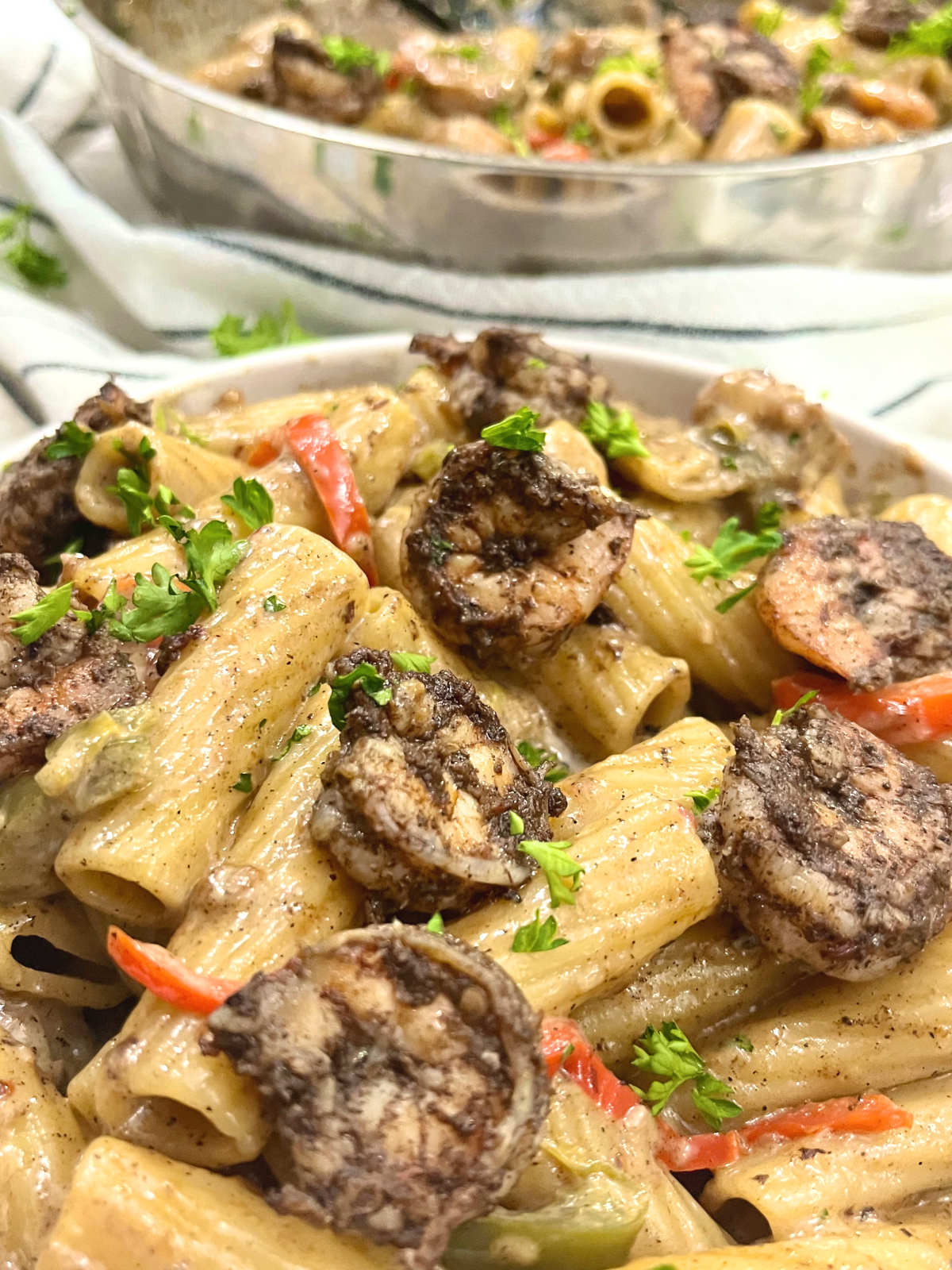 jerk shrimp pasta in a bowl
