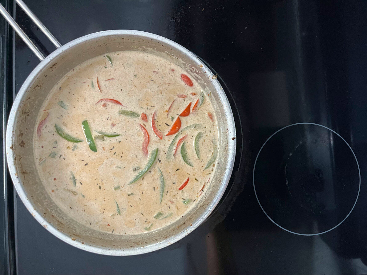 preparing the sauce for the recipe in a pan
