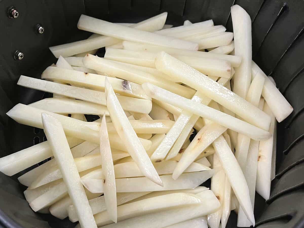 cut potatoes in an air fryer basket