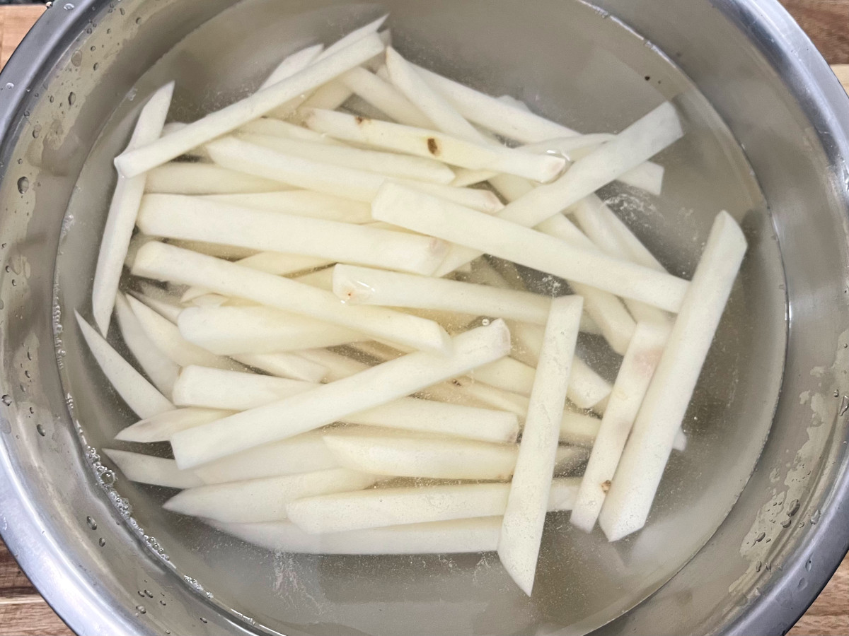 cut potatoes soaking in water