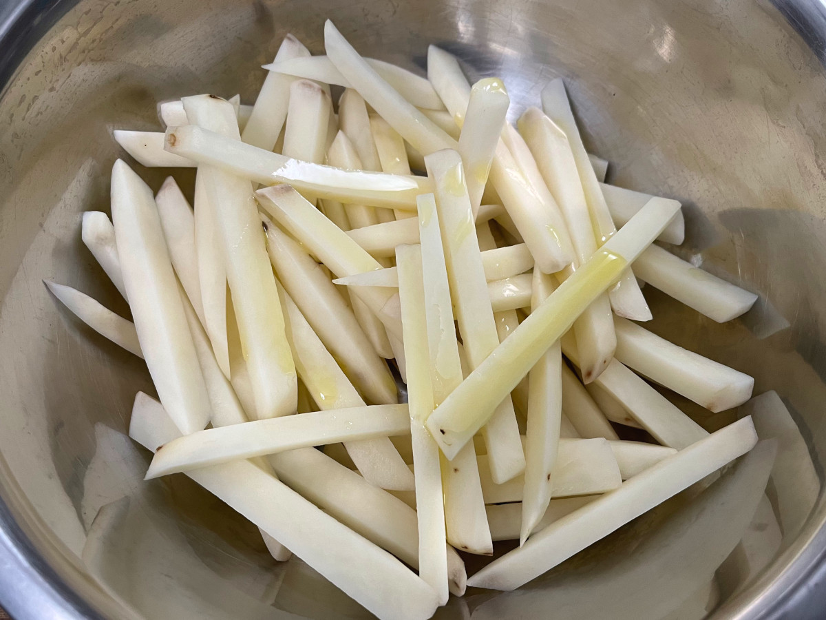 cut potatoes in a bowl