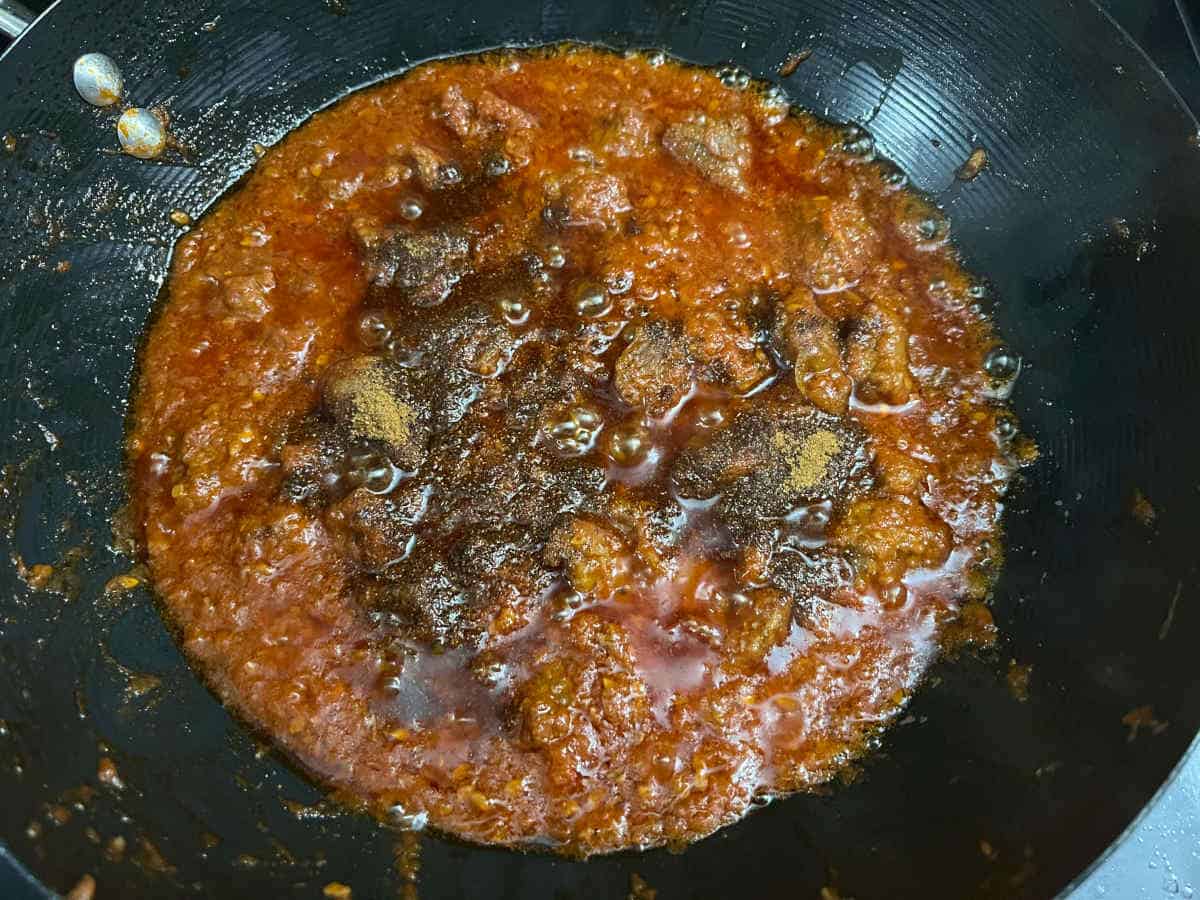 added garam masala to the pan with the sauce