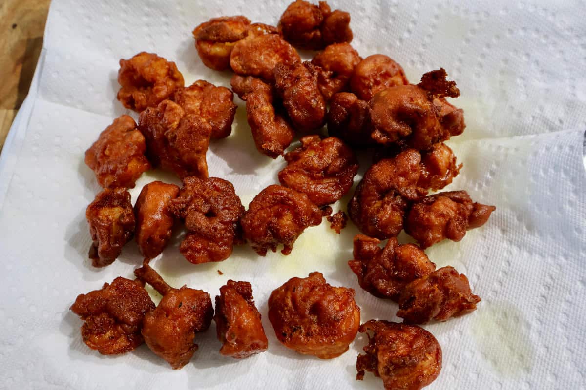 deep fried prawns on a paper towel